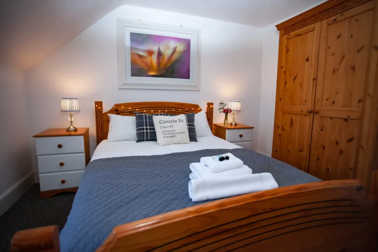 Standard double room at The Courie Inn with comfortable furnishings
